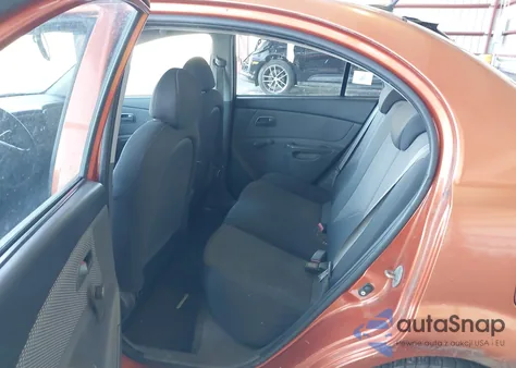 2009 Kia Rio Lx z USA, uszkodzony, nr VIN KNADE223496515595